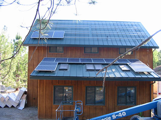 Slide image 10 roof mounted solar panels beginning of project