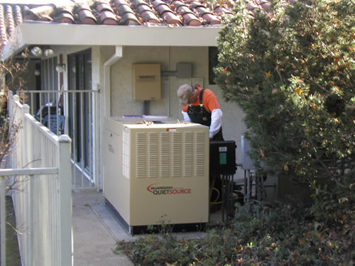 Carnahan Electric Specialist installing a generator for a house